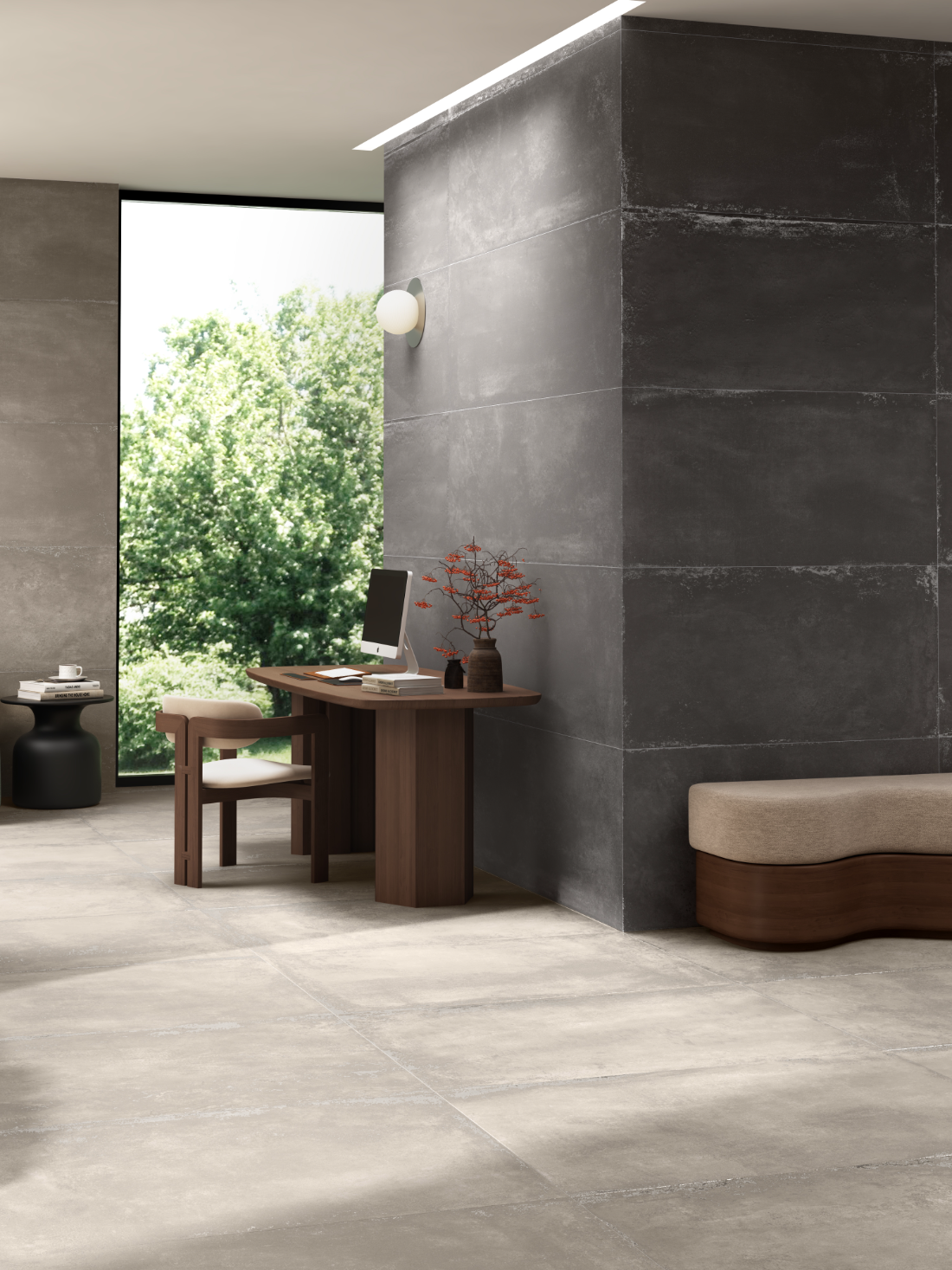 CarvoTech surfaces in a quiet study, a dark grey clad volume beside a pale large-format floor